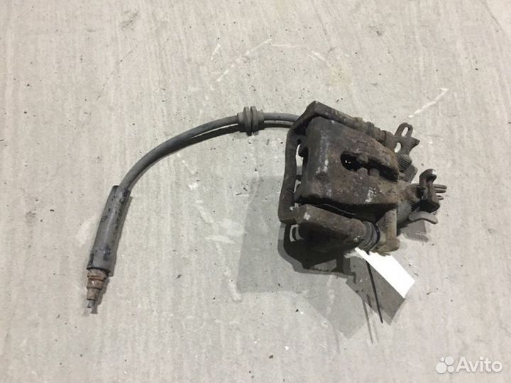 Суппорт тормозной задний левый Ford Kuga 1 2.5 I