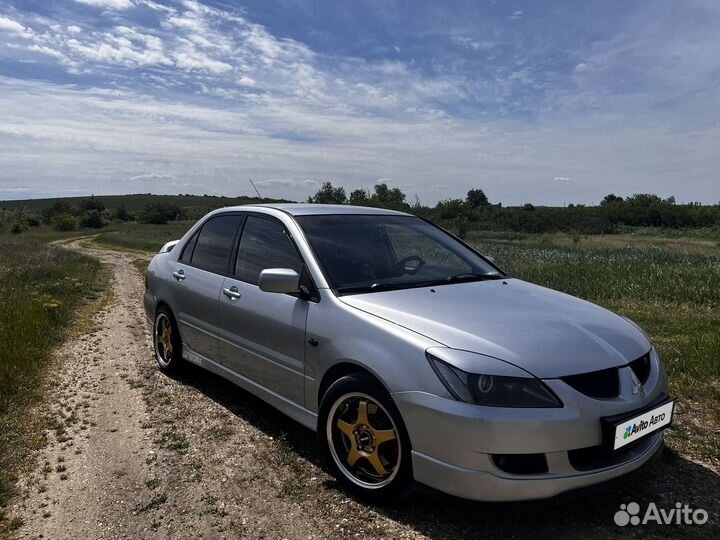 Mitsubishi Lancer 2.0 МТ, 2004, 233 000 км