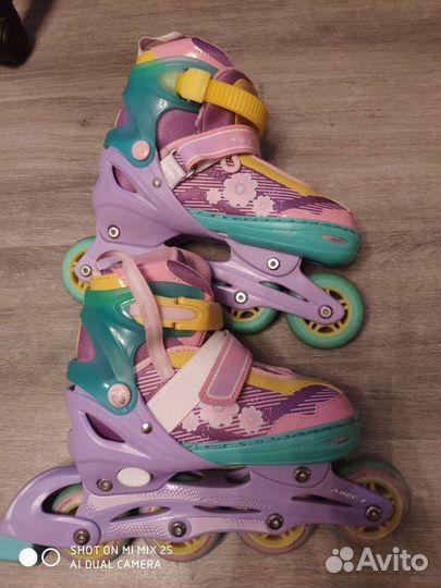 Роликовые коньки