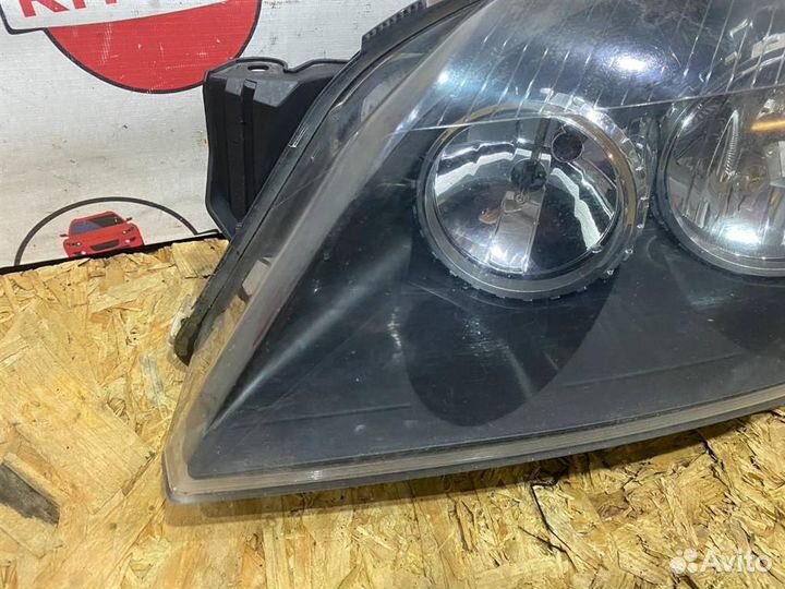 Фара левая Opel Astra H GTC