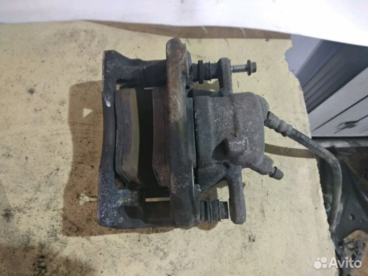 Суппорт тормозной Ниссан Альмера G15