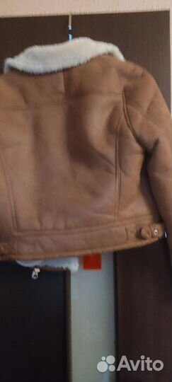 Рыжая маленькая курточка, очень симпатичная