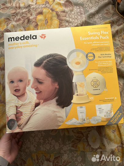Молокоотсос medela swing flex