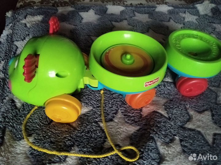 Игрушка каталка