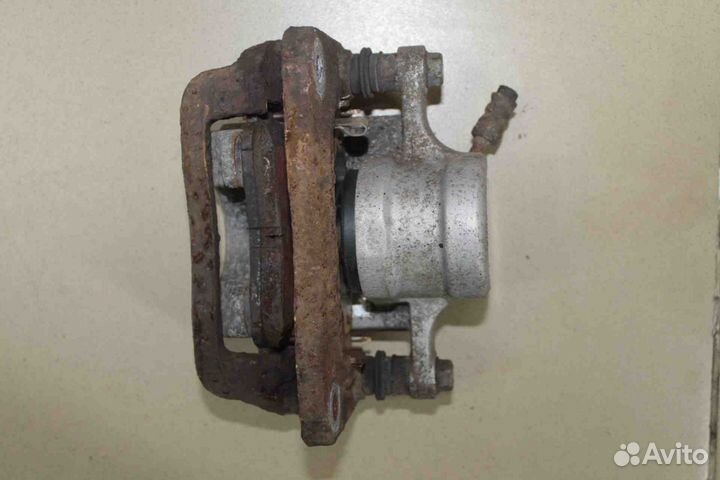 Суппорт тормозной задний левый Hyundai Santa Fe (C