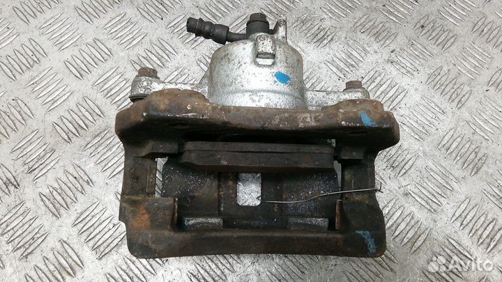 Суппорт передний левый Nissan Almera N16 рест