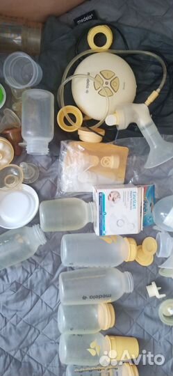 Молокоотсос medela электрический