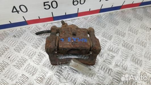 Суппорт тормозной задний левый subaru impreza 3 (K