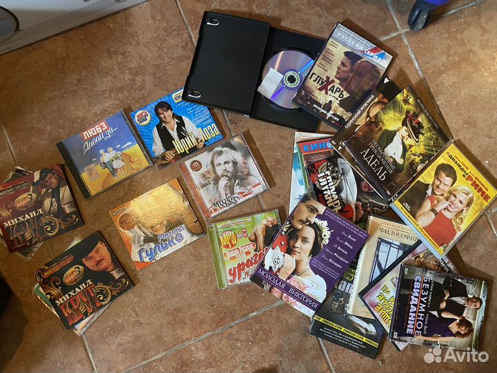 CD диски с музыкой и фильмами,компакт диски