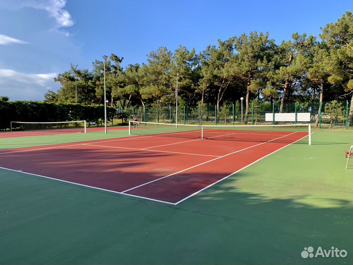 Тренер по теннису