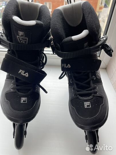 Роликовые коньки