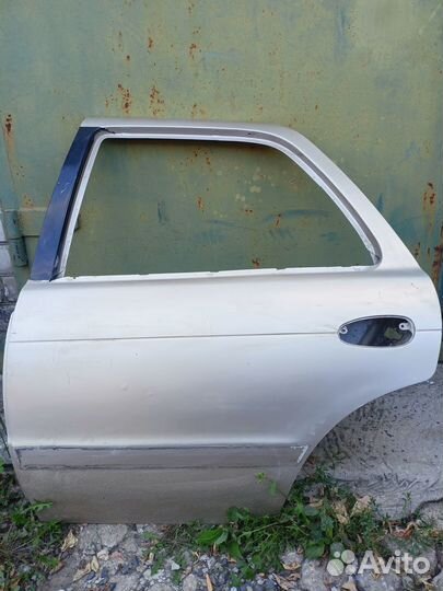 Дверь задняя левая kia sephia