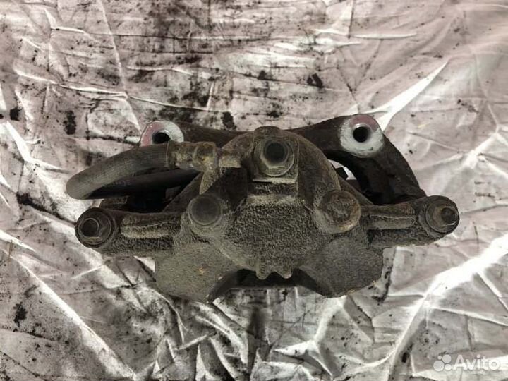 Суппорт тормозной передний правый Opel Astra J До