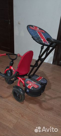 Трехколесный велосипед с ручкой