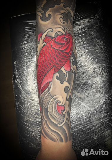 Мастер по татуировкам