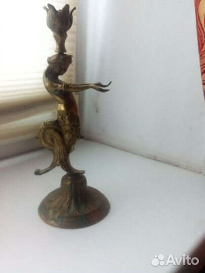 Статуэтка подсвечник