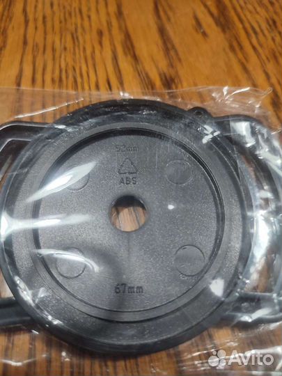 Универсальный держатель крышки фотоаппарата