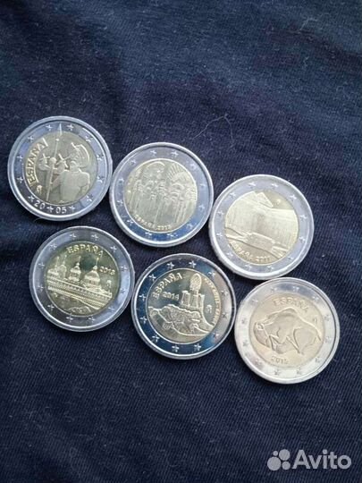 Монеты погодовка Испания и Португалия