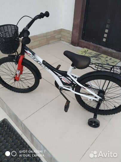 Детский трехколесный велосипед