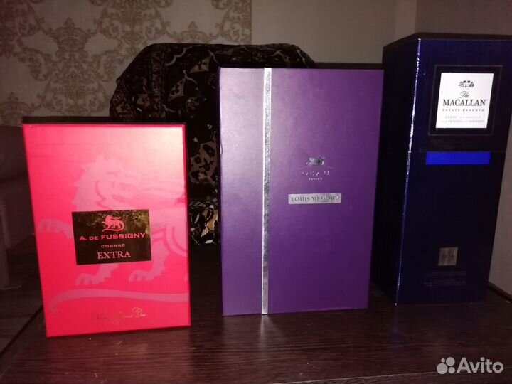 Бутылки и коробки из под элитного виски