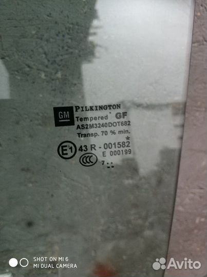 Стекло задней левой двери Опель Зафира Б
