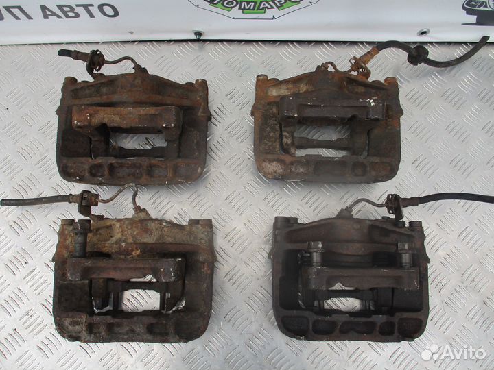 Суппорт тормозной передний VW Transporter T4