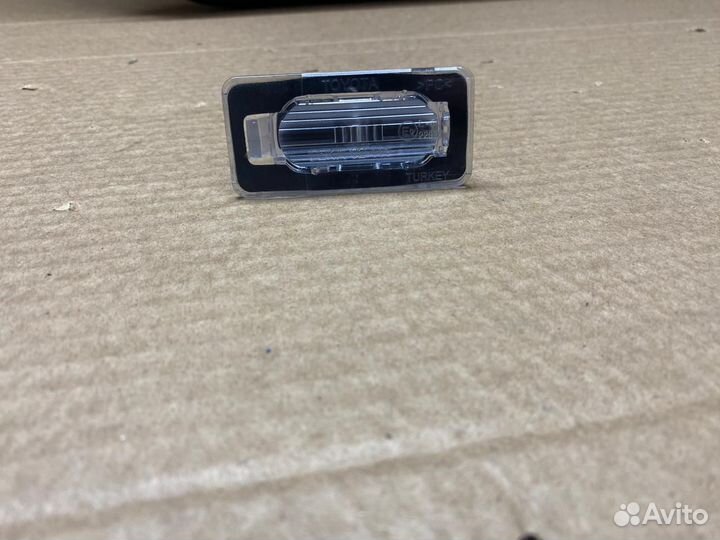 Лампа освещения номерного знака Corolla Е210