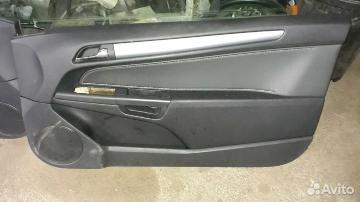 Обшивки дверей на опель астра H купе