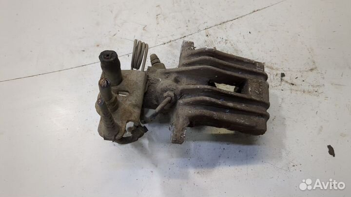 Суппорт левый задний Volkswagen Caddy