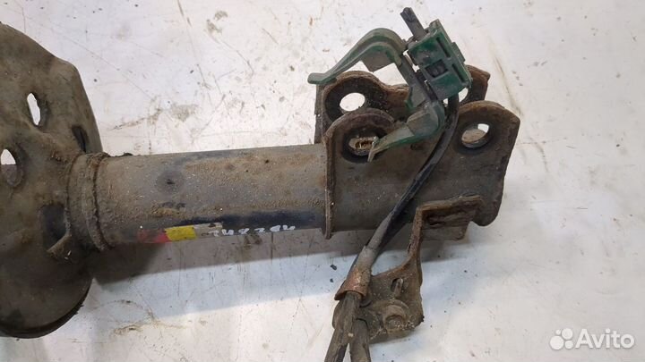 Амортизатор подвески левый передний Toyota Avensis 1