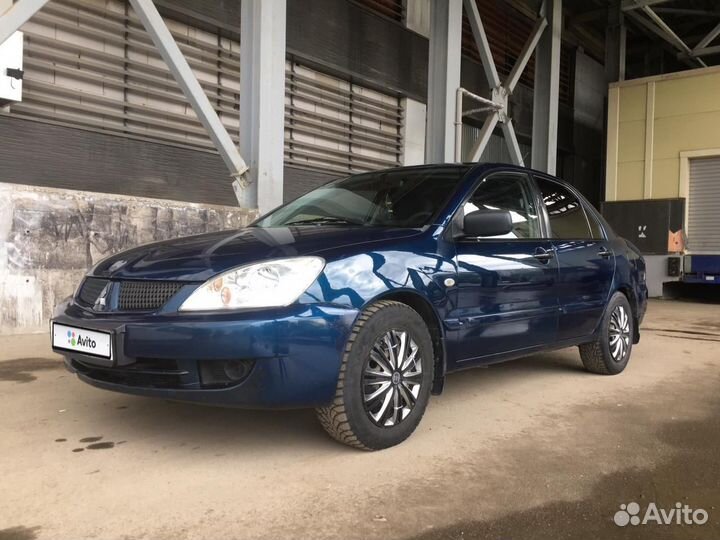 Mitsubishi Lancer 1.3 МТ, 2006, 195 700 км