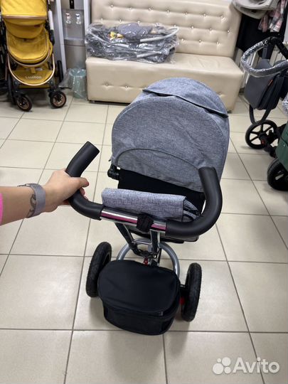 Трехколесный велосипед с поворотным сиденьем