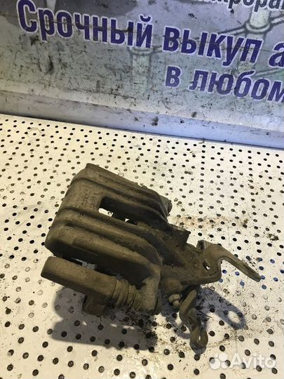 Суппорт тормозной задний левый Skoda Yeti