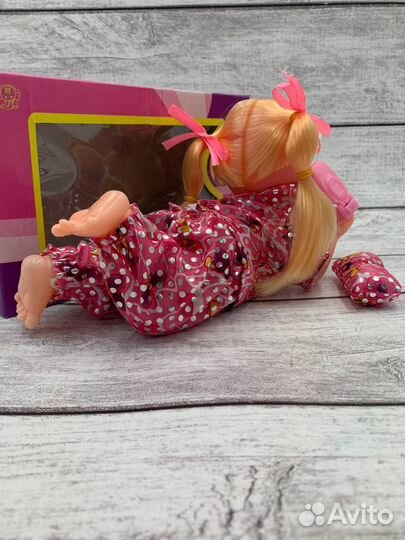 Кукла музыкальная