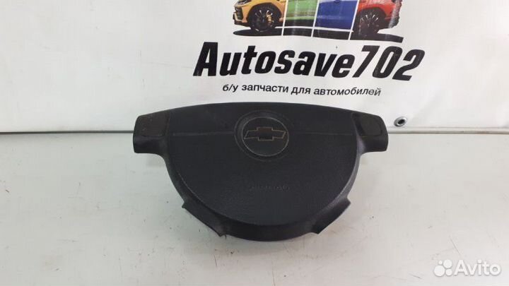 Подушка безопасности водителя (в рулевое колесо)