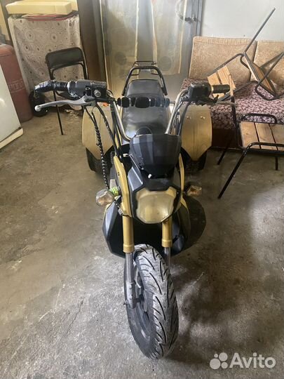 Электрический трицикл