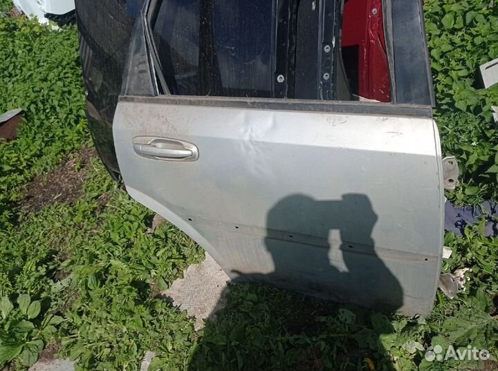 Дверь лачетти универсал