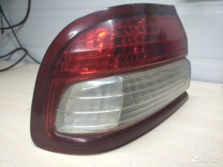 Фонарь задний левый Nissan Cefiro A32