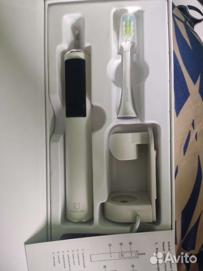 Электрическая зубная щетка