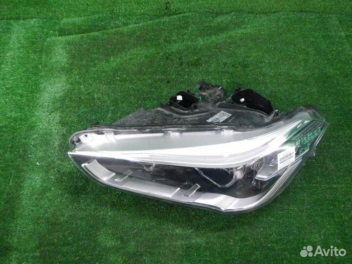 Фара левая BMW X1