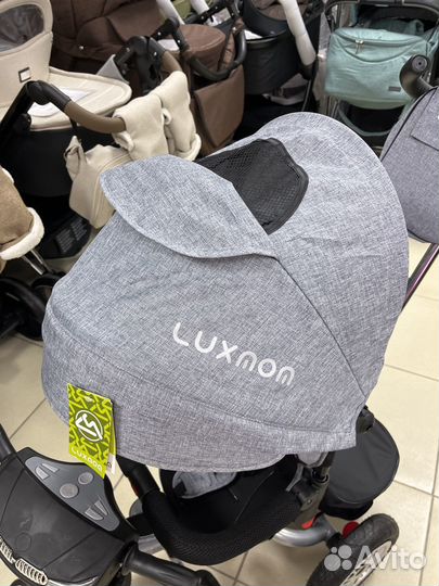 Трехколесный велосипед с поворотным сиденьем