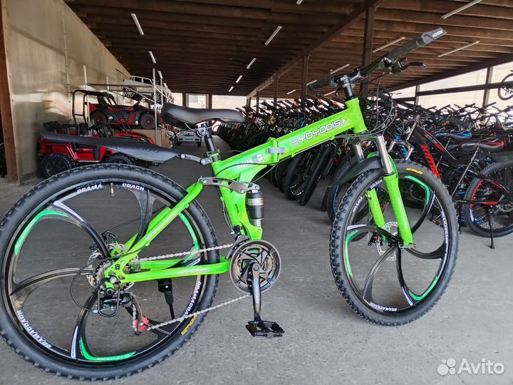 Велосипед на литых дисках и складной раме