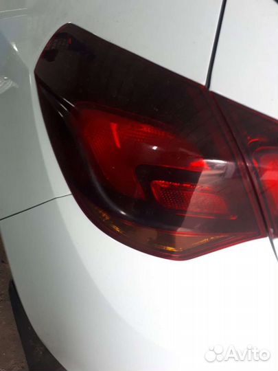 Фонарь левый Астра J хечбек