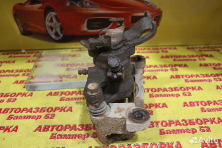 Суппорт тормозной задний правый Mitsubishi Outland