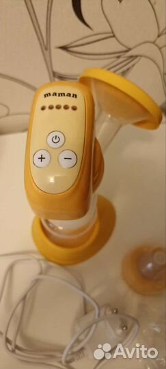 Электрический молокоотсос Maman
