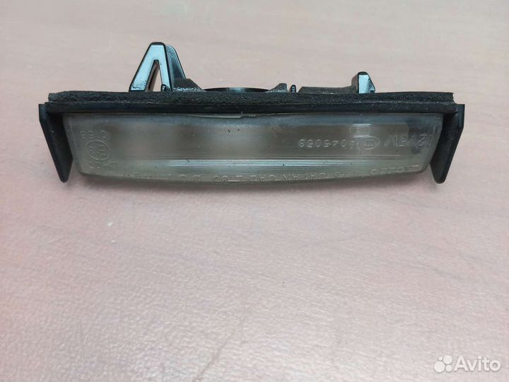 Фонарь освещения номерного знака