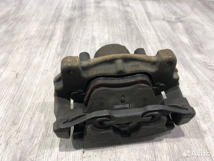 Суппорт тормозной передний левый Ford Mondeo 4