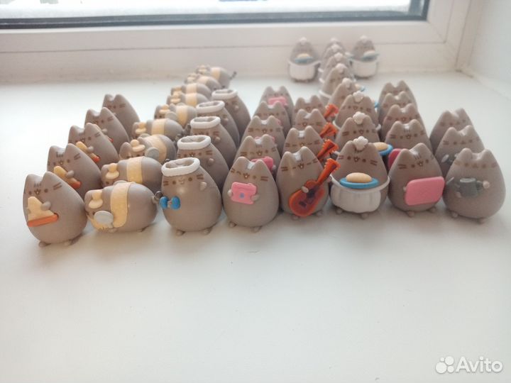 Игрушки котики пушины