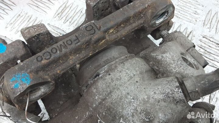 Суппорт тормозной задний правый на Ford Focus 2