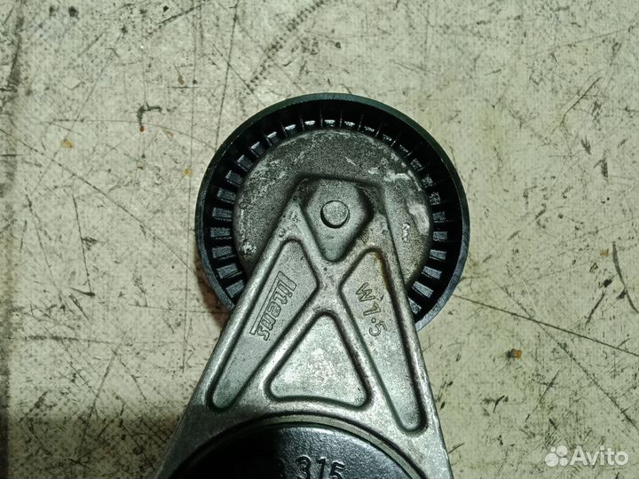 Натяжитель ремня Volkswagen Golf